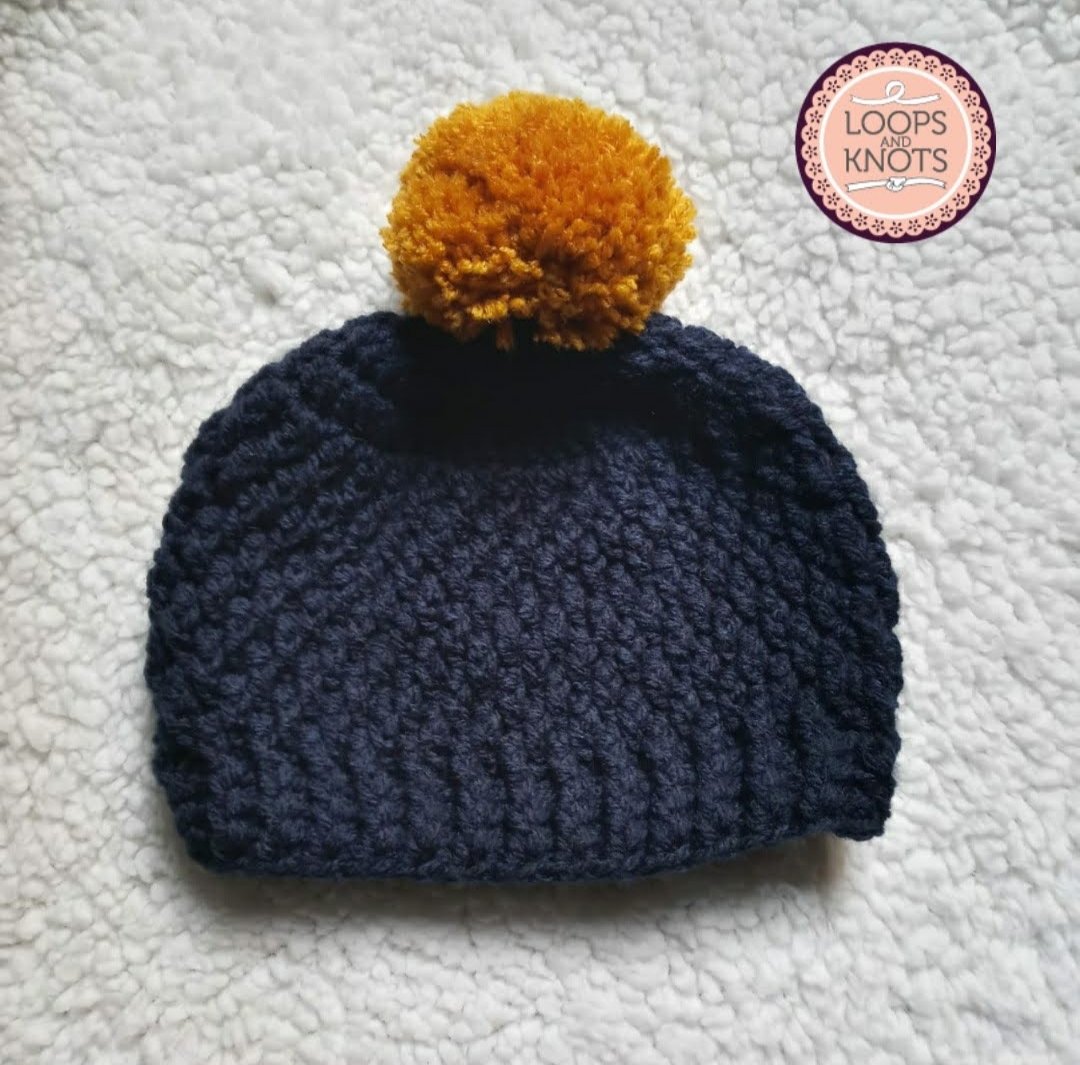 WhatsApp Image 2026-06-02 at 10.46.37 AM Handmade Crochet Baby Pom Pom Cap – Woollen Winter Beanie - Image 1