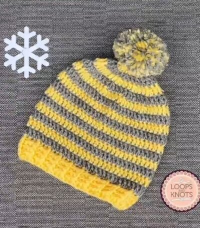 Handmade grey and yellow crochet striped pom pom beanie cap with colourful winter design