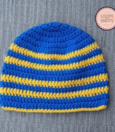 Handmade blue and yellow crochet striped baby beanie cap with colourful winter design
