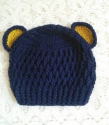 Handmade navy blue crochet baby bear ear beanie cap with mustard yellow inner ear details