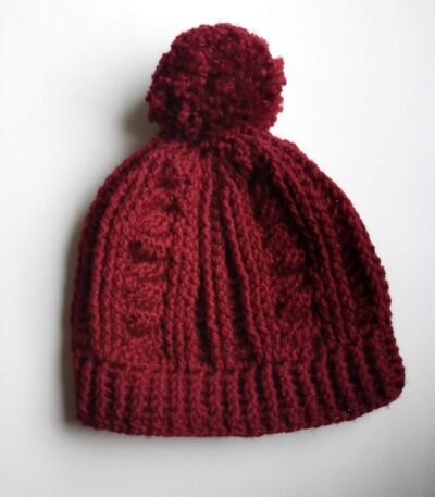 Handmade maroon ribbed crochet baby beanie cap with matching fluffy pom pom